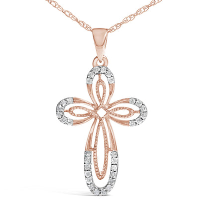 Front-facing rose-colored cross necklace pendant with openwork design and prong-set round white gemstones on outer edges.