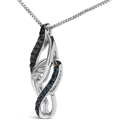 Close-up front angle of a white metal necklace pendant with an intertwined abstract loop design featuring round white, blue, and black gemstones in prong and shared prong settings, shown hanging on its chain.