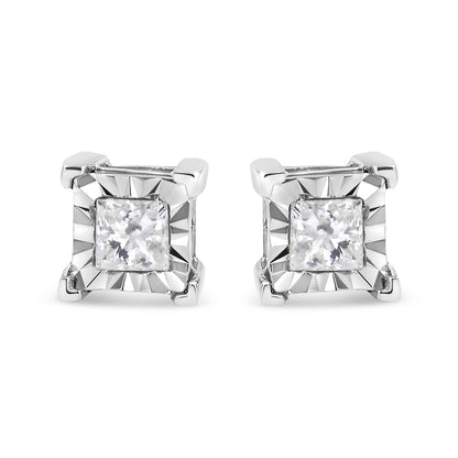 Front view of white metal stud earrings with square white gemstones in a starburst setting.