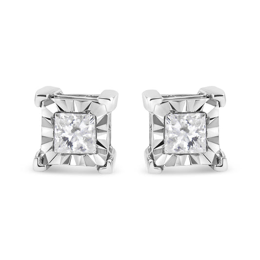 Front view of white metal stud earrings with square white gemstones in a starburst setting.