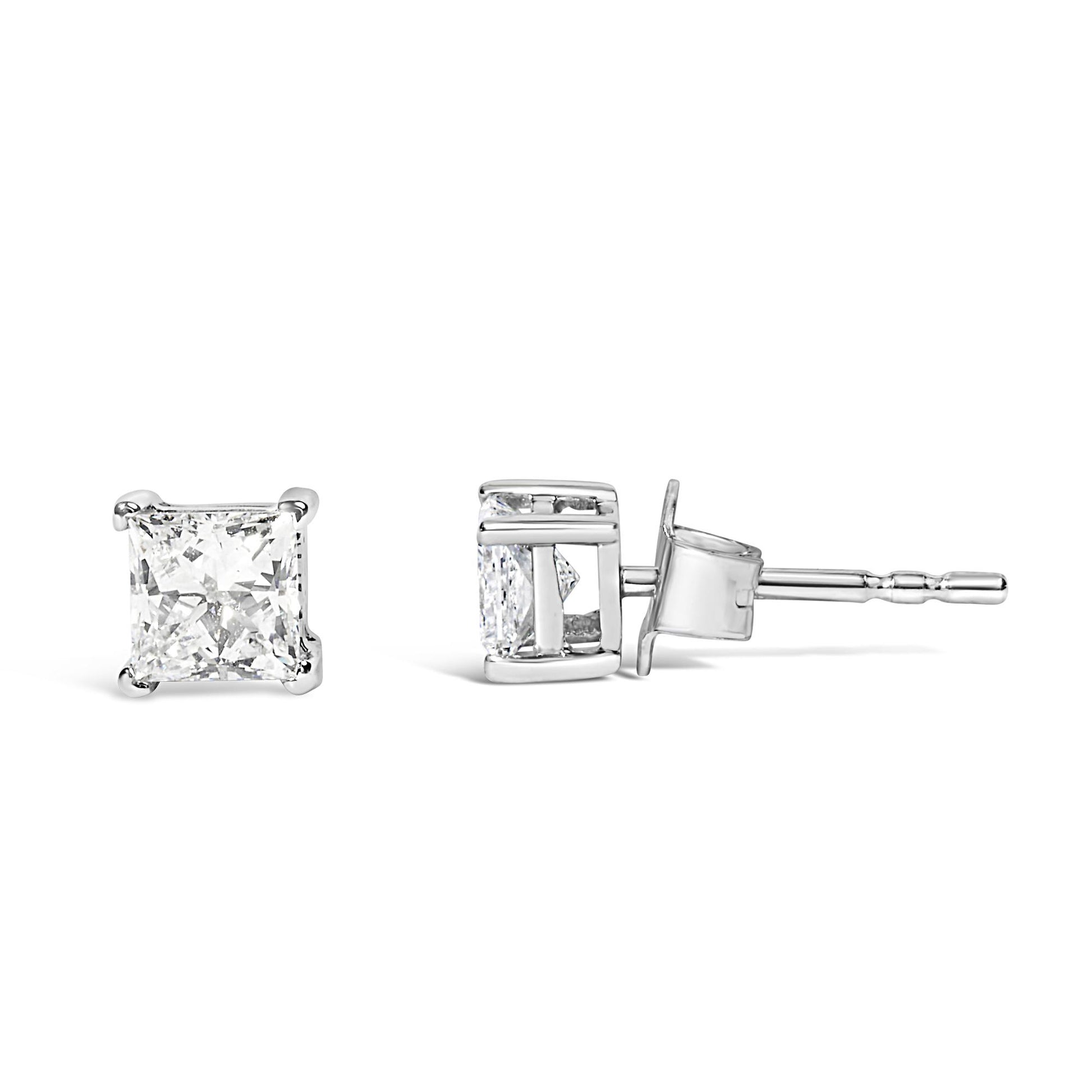 Front and side view of white metal stud earrings with prong-set princess-shaped white gemstones, shown on a white background.