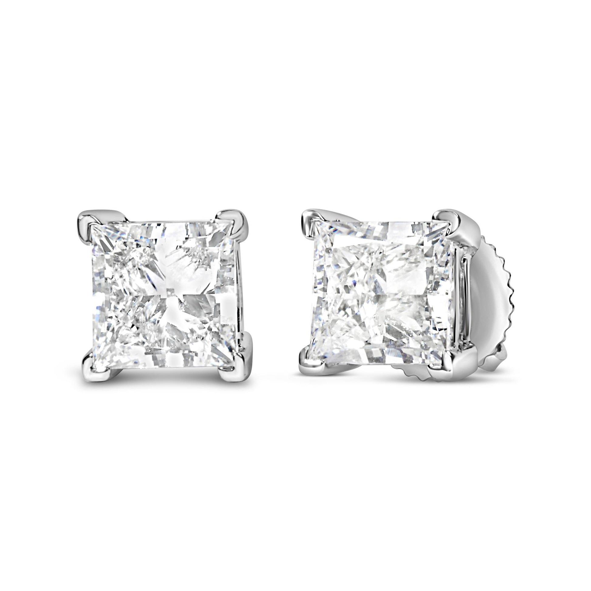 Close-up front and angled side view of white metal stud earrings with square-shaped white gemstones held by four prongs.