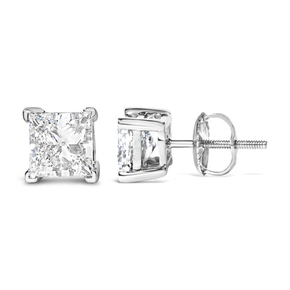 Close-up image of white metal stud earrings with princess-shaped white gemstones in four-prong settings, shown from front and side angles.