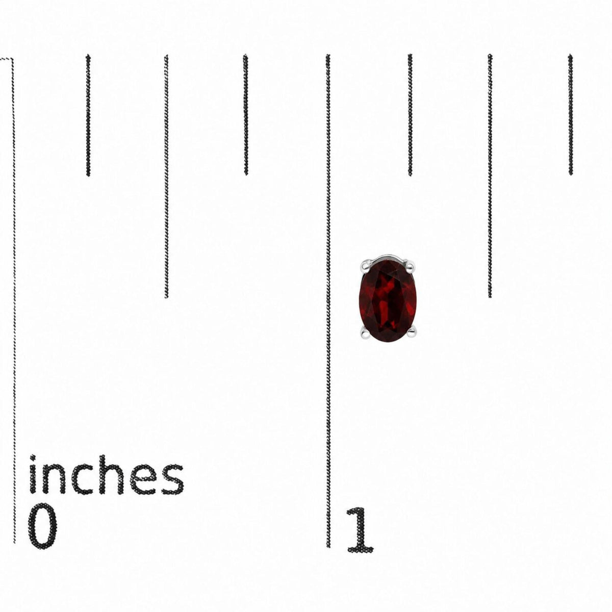 Close-up front view of oval-shaped red gemstone earrings with four-prong white metal settings shown on a scale with inch measurements.
