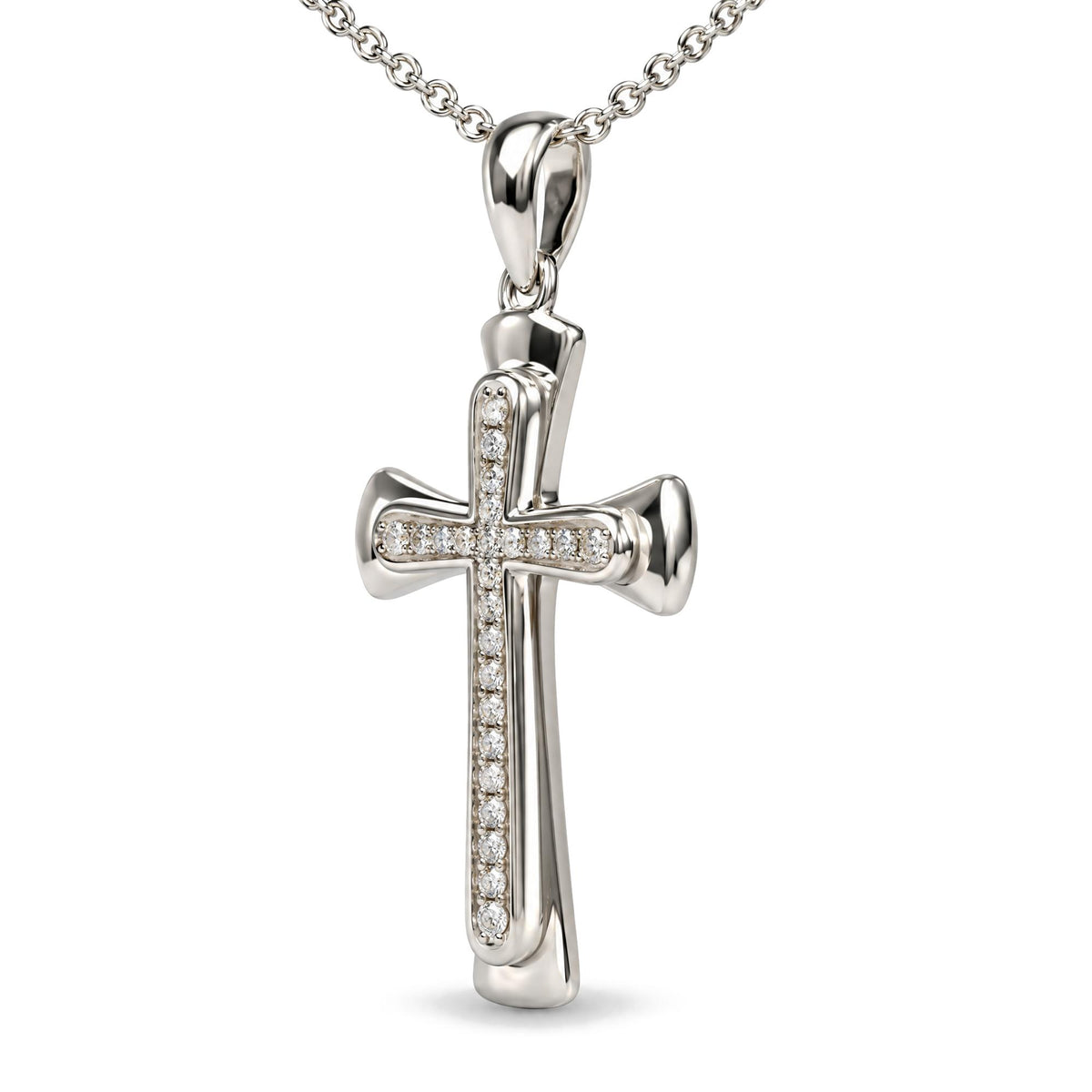 Close-up front angle of a white metal cross-shaped necklace pendant adorned with round, white gemstones set in prongs, shown on a white background.