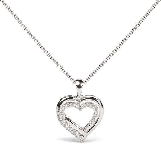 Close-up front view of a white metal necklace with a heart-shaped pendant featuring white gemstones set in prong settings along the heart outline, shown on a white background.