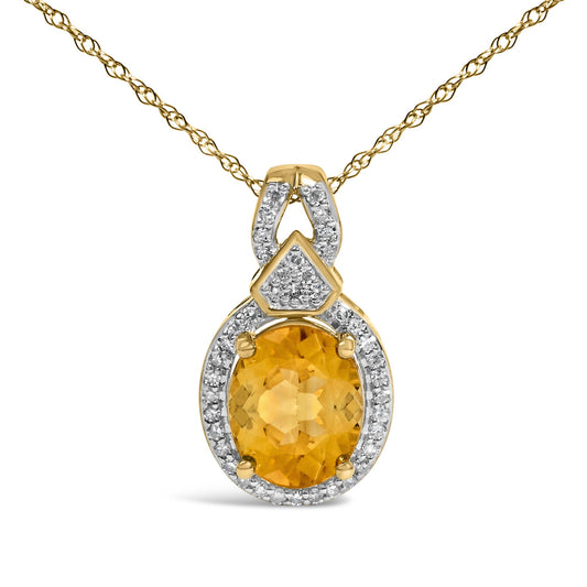 Front view of 14K yellow gold citrine and 1/5 cttw diamond pendant necklace showcasing oval citrine and diamond halo
