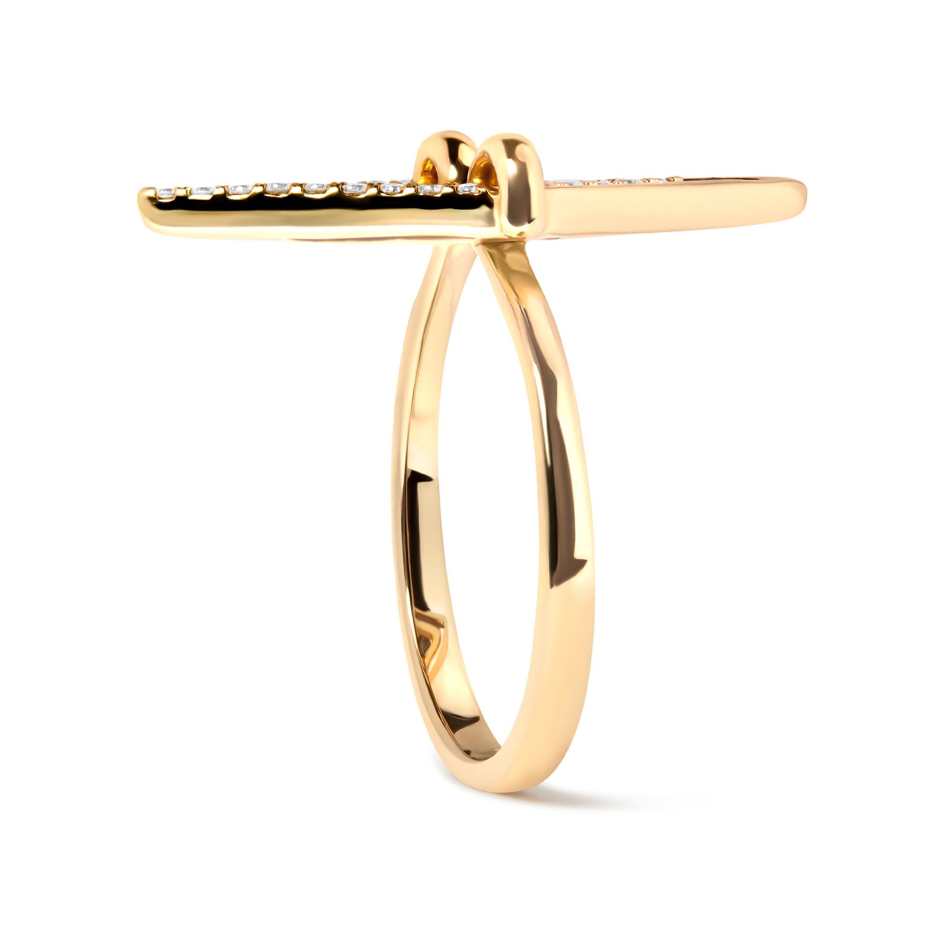 Yellow metal ring with a horizontal bar featuring white round gemstones in pave setting, shown from a side angle.