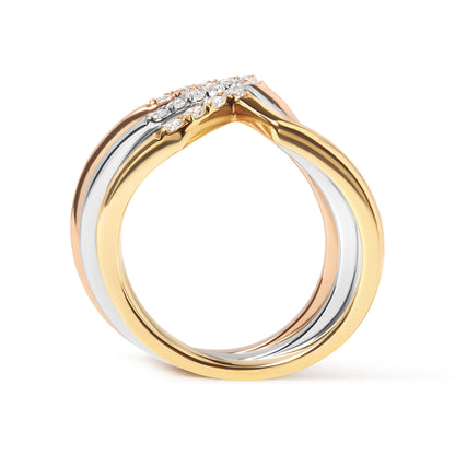 Close-up side angle of a tri-color ring with intertwined yellow, white, and rose metal bands accented by small round white gemstones in a pave setting.