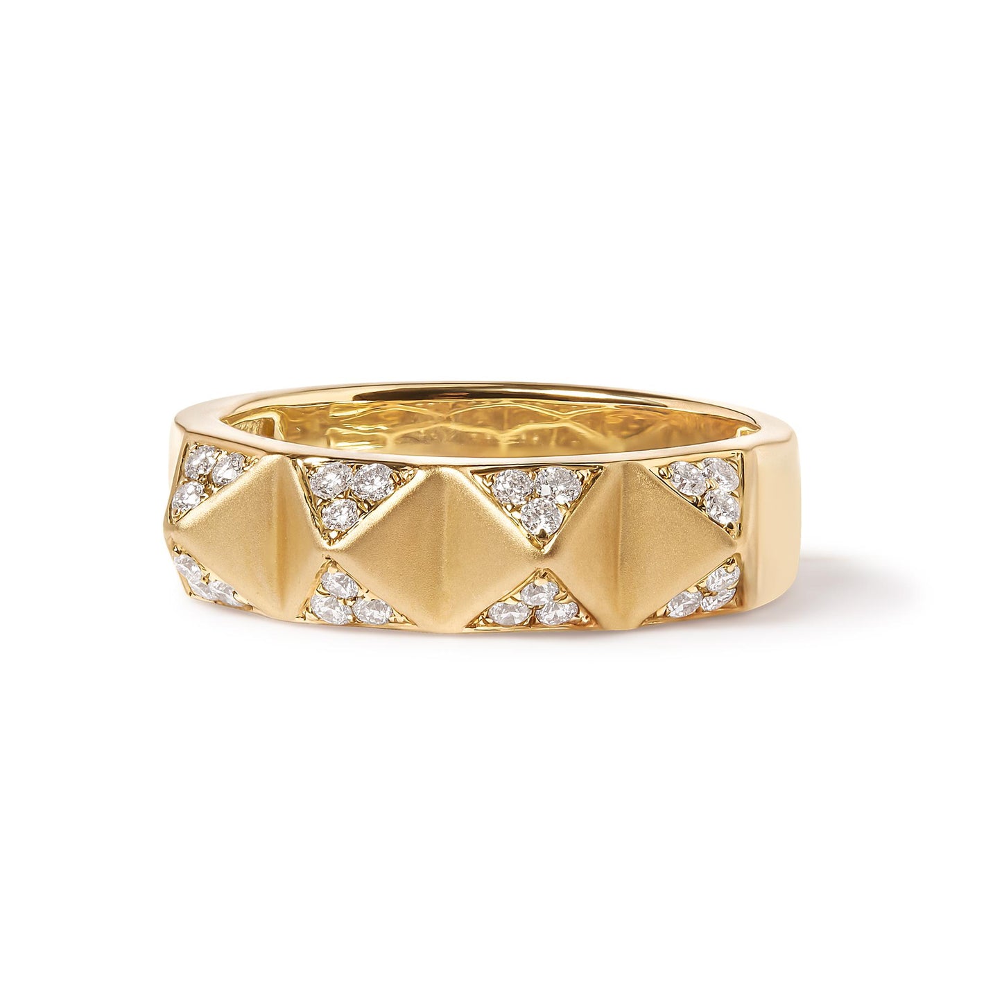 Yellow metal ring with pyramid-shaped details and clusters of small white gemstones in a pave setting, shown in a close-up side angle.