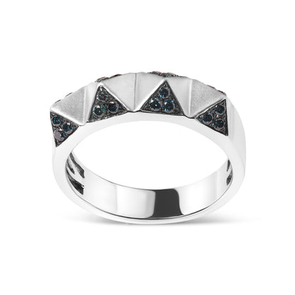 White metal ring with triangular raised patterns, each set with small blue round gemstones in pave setting, shown from a front angle.
