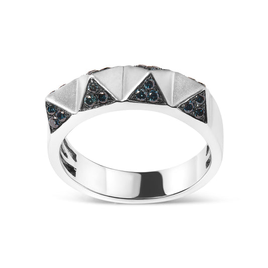 White metal ring with triangular raised patterns, each set with small blue round gemstones in pave setting, shown from a front angle.