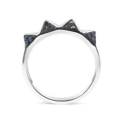 White metal ring with triangular points set with small round blue gemstones in a pave setting, shown in a straight-on side profile view.