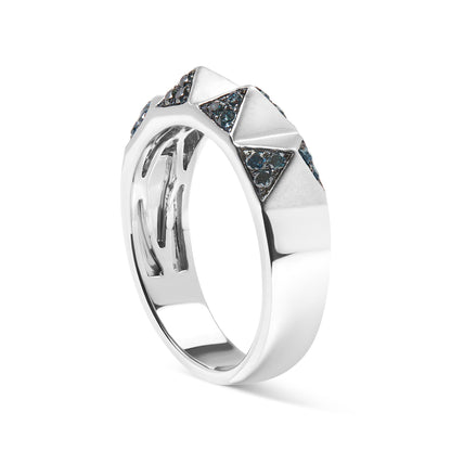 White metal ring with triangular raised sections featuring pave-set blue gemstones, shown in a three-quarter side view.