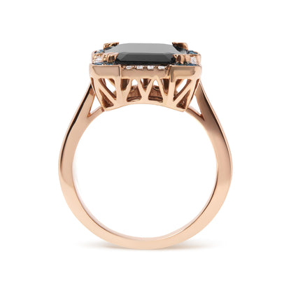 Side view of a rose-colored ring with a black emerald-shaped gemstone in a four-prong setting, surrounded by small white and blue round pave-set gemstones.