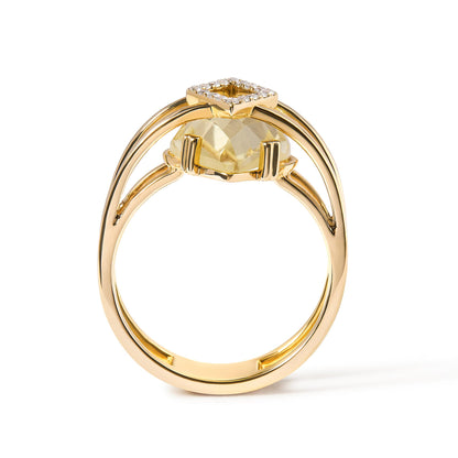Side view of a yellow metal ring featuring a marquise-shaped yellow gemstone in prong setting and a square cluster of round white gemstones in pave setting on top.
