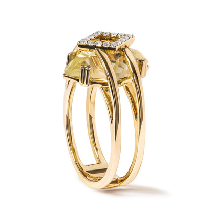 Yellow metal ring with a marquise-shaped yellow gemstone in prong setting and a square cluster of round white gemstones in pave setting, shown in a close-up angled side view.