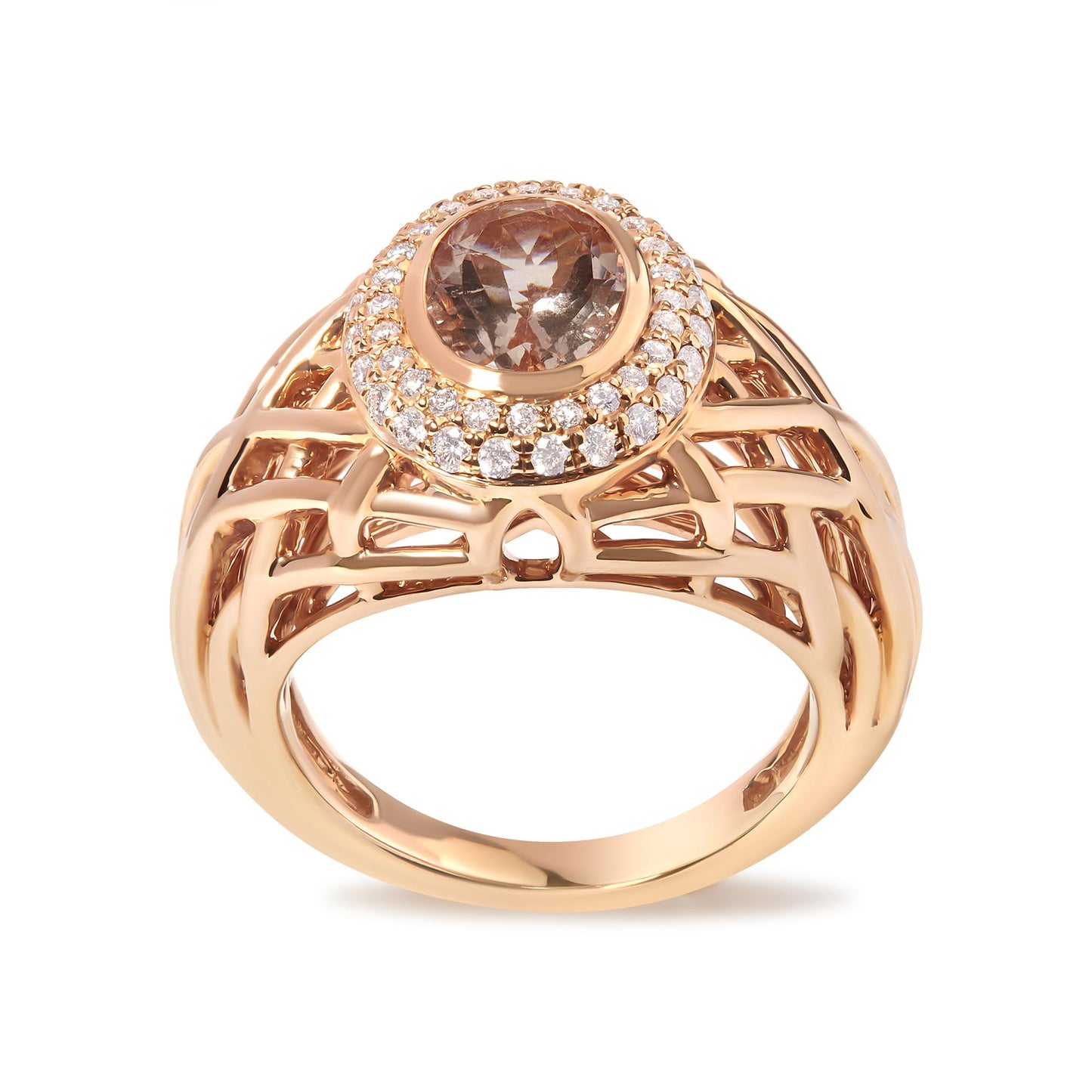 Close-up front angle of a rose-colored metal ring with an oval pink gemstone in a bezel setting, surrounded by round white gemstones in a pave setting, featuring an open lattice design on the band.