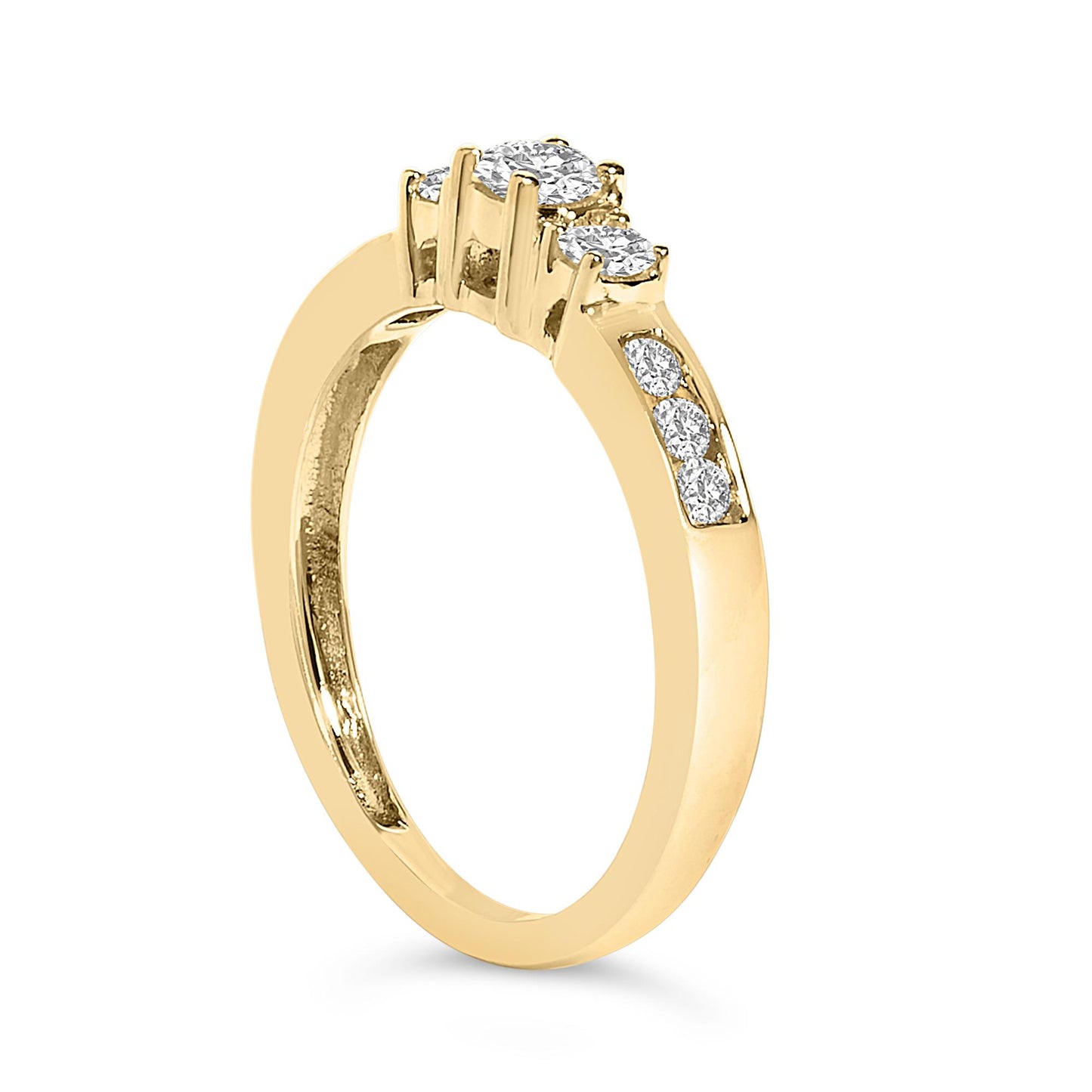Yellow metal ring shown in a side angle with a three white gemstones in four-prong settings across the top and additional white gemstones set in a channel setting on the band side.