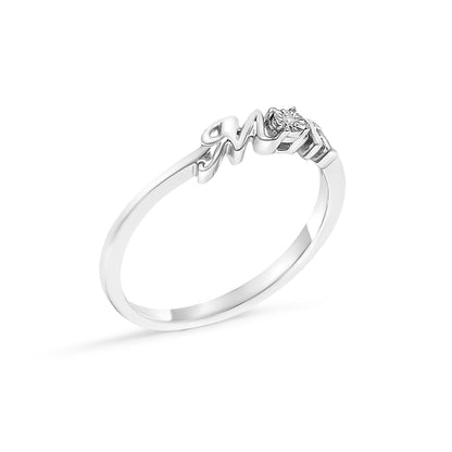 White metal ring with a single round white gemstone in prong setting, shown at an angled side view.