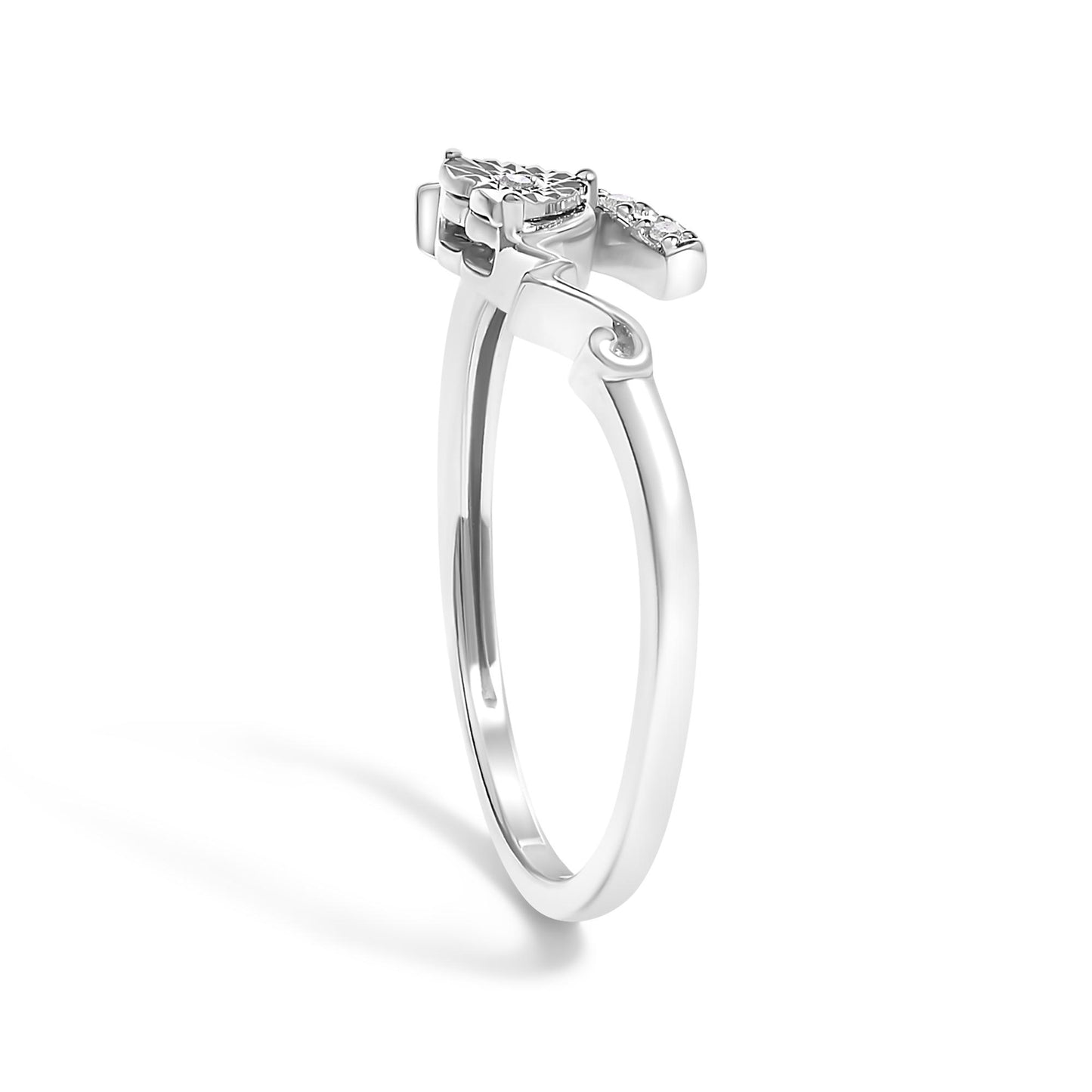 Side angle view of a white metal ring featuring four round white gemstones in prong settings.