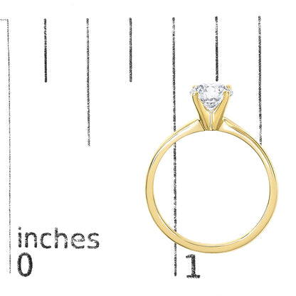Close-up image of a yellow metal ring with a single round white gemstone in a 4-prong setting, shown on a measurement scale, photographed from the front angle.