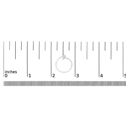 White metal ring with one round white gemstone and two round white gemstones in shared prong settings, shown on a ruler scale from a top-down angle.