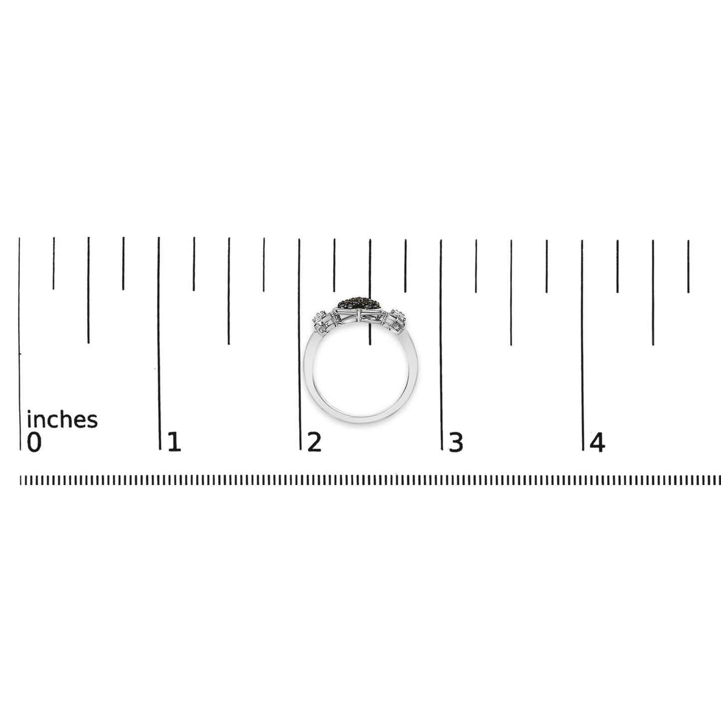 White metal ring with a row of blue gemstones in the center flanked by white gemstones on each side, shown on a ruler scale, side angle view.