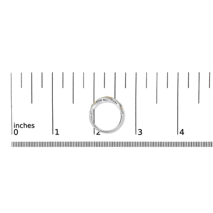 Ring with yellow and white metal featuring round white gemstones in prong settings and round blue gemstones in bezel settings, shown from the top on a ruler scale.
