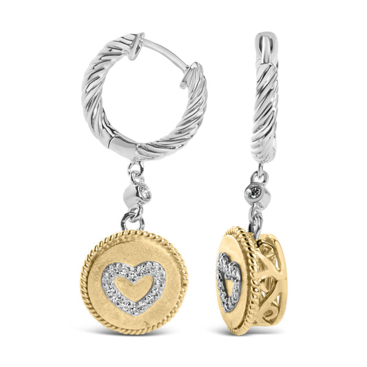 Front and side view of two-tone hoop earrings with a round yellow disc pendant featuring a heart shape outlined with white gemstones, photographed on a white background.