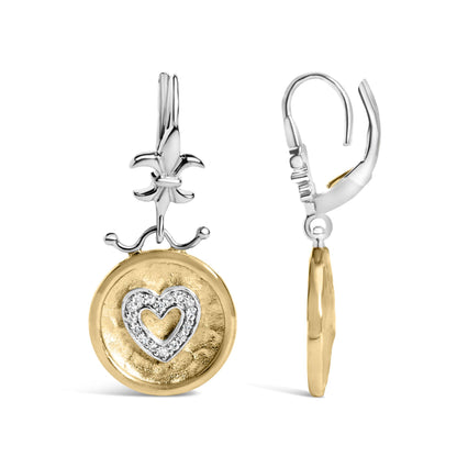 Front and side views of drop earrings featuring a round yellow metal disc with a white metal heart outline set with white round gemstones, topped with a fleur-de-lis design in white metal.