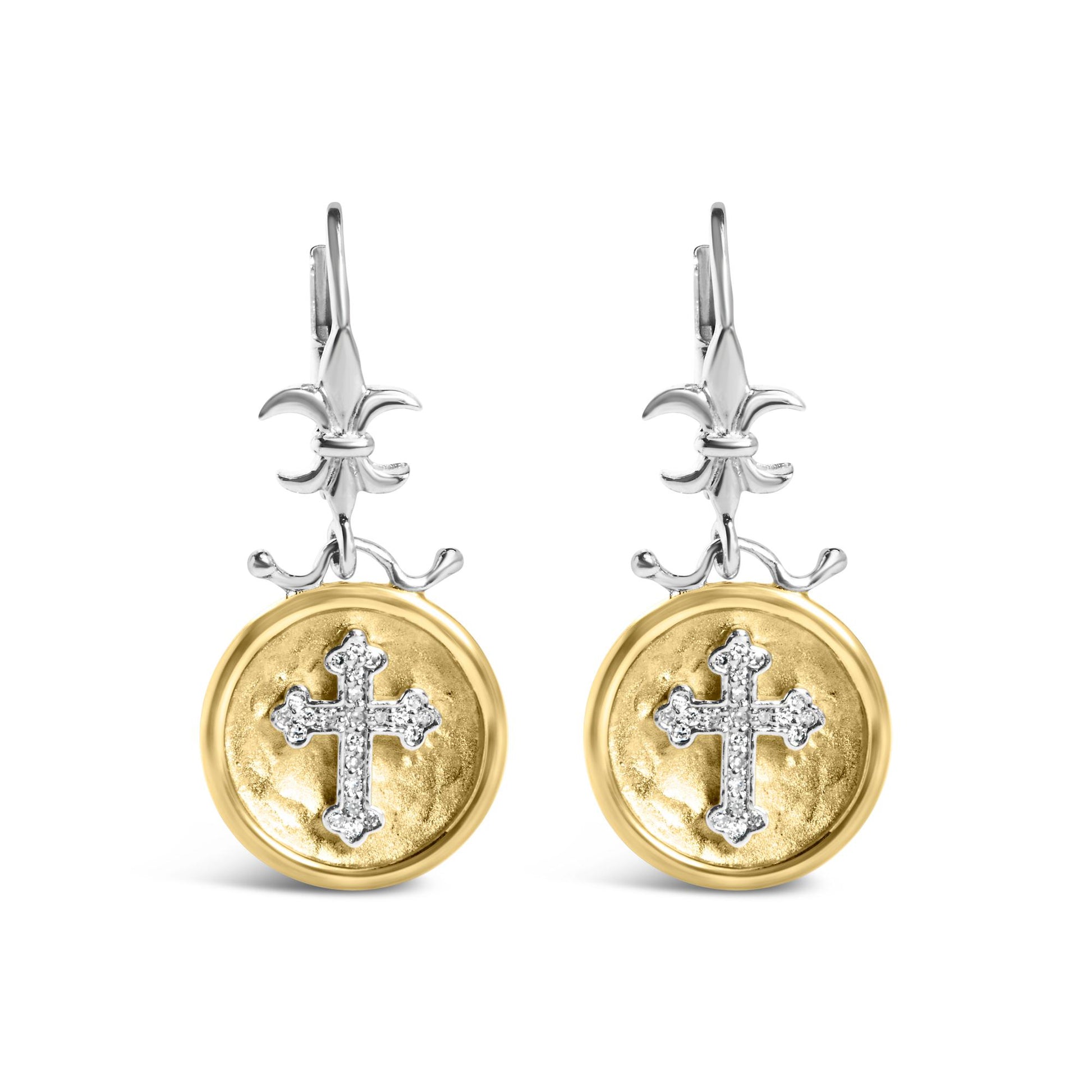 Front view of yellow and white metal drop earrings with round discs featuring a white gemstone cross and fleur-de-lis detail at the top.