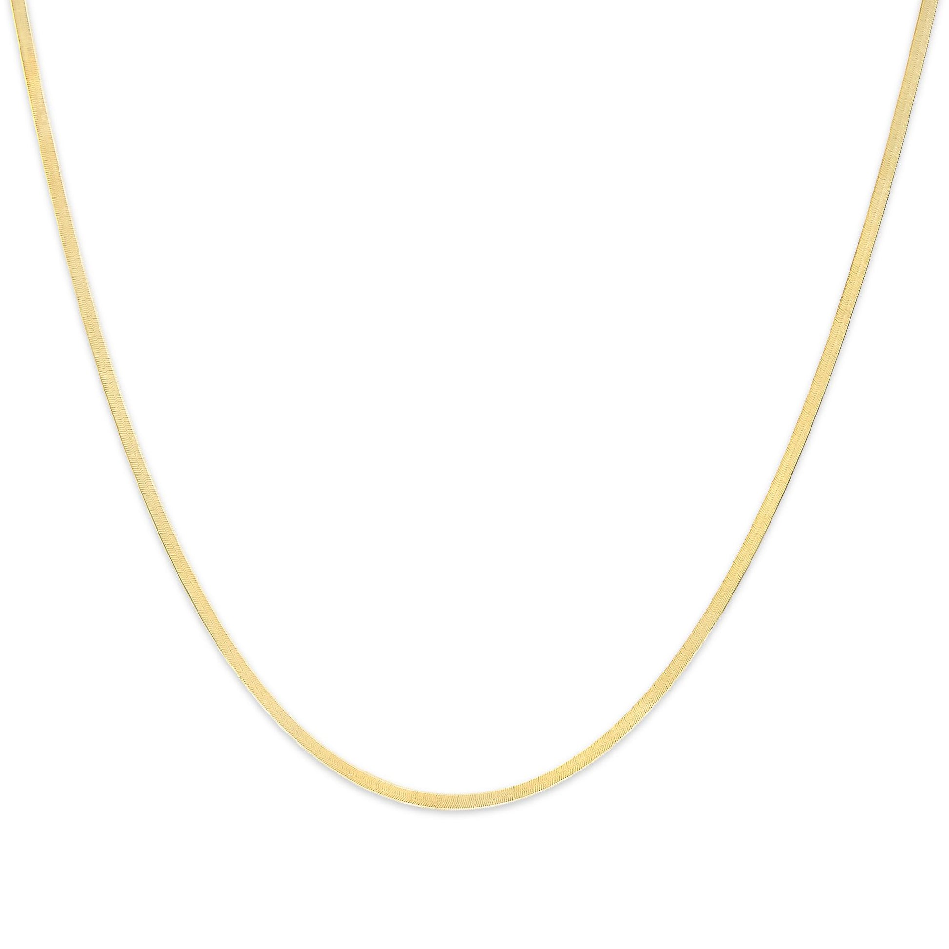 Close-up front angle of a thin yellow chain necklace on a white background.