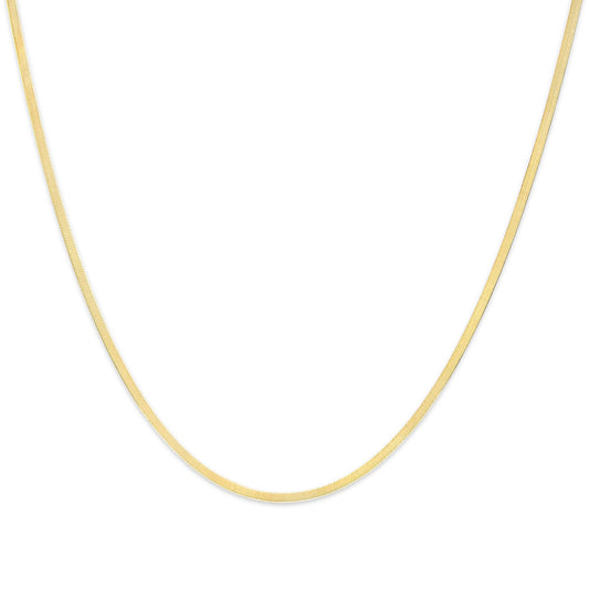 Close-up front angle of a thin yellow chain necklace on a white background.