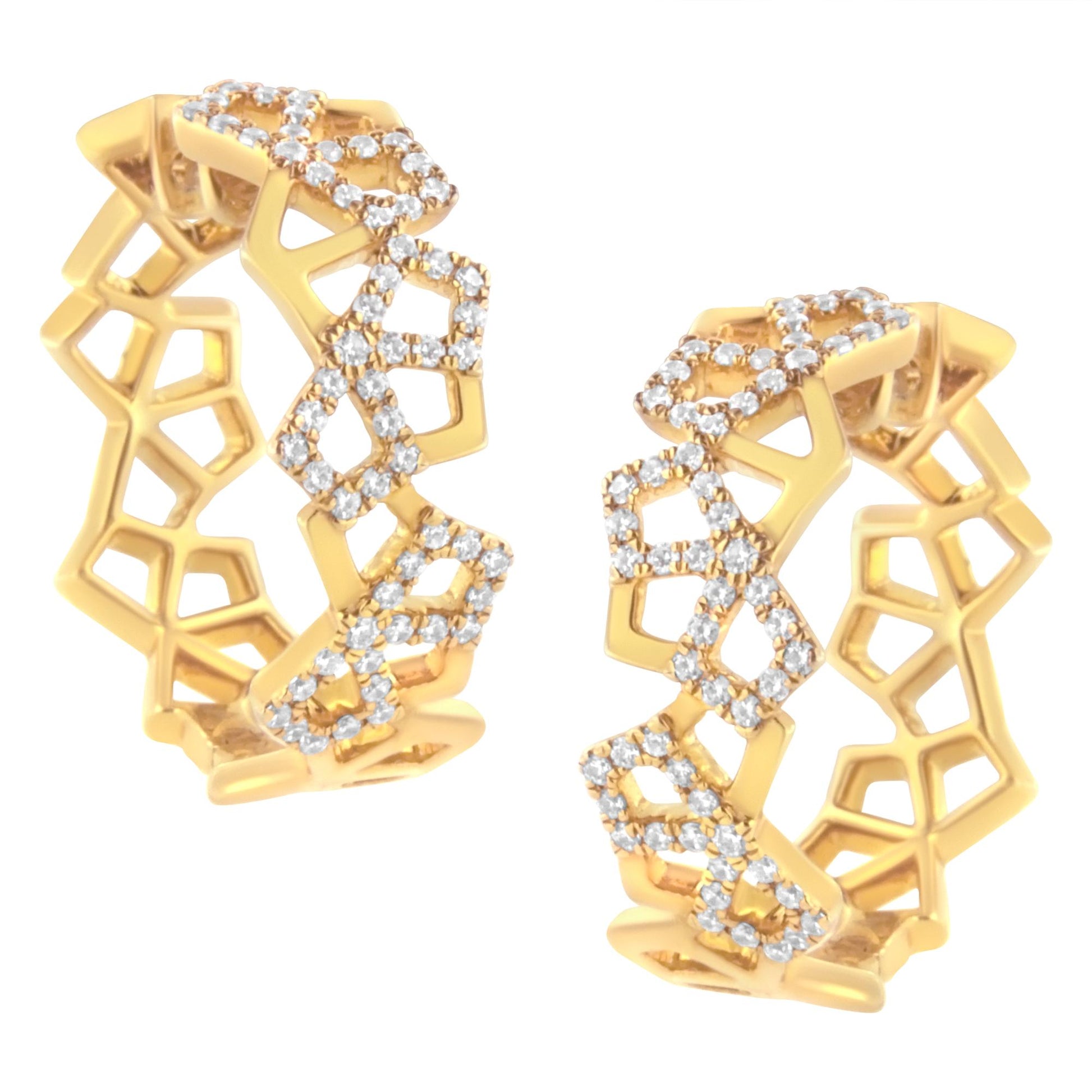 Pair of yellow metal hoop earrings with geometric openwork design, adorned with multiple small white gemstones in pave setting, shown in a close-up front angle.