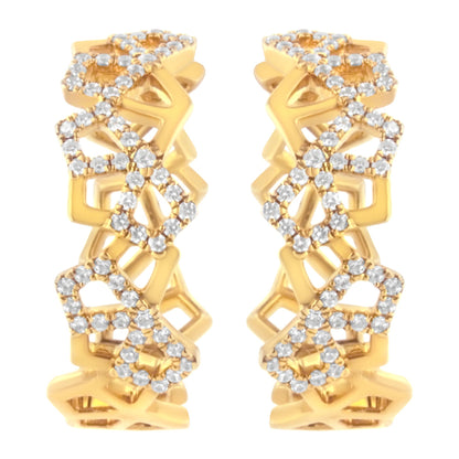 Pair of yellow metal earrings with open geometric design and pave white gemstones, shown from the front angle.