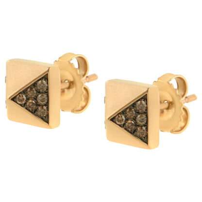 Close-up front angle of rose-colored square stud earrings with a triangular section set with small round brown gemstones in prong settings.