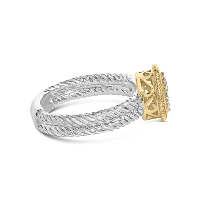 Side angle of a two-tone ring with a twisted white metal band and a yellow metal setting featuring multiple small round white gemstones in a shared prong setting.