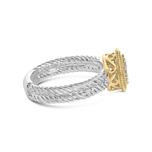 Side angle of a two-tone ring with a twisted white metal band and a yellow metal setting featuring multiple small round white gemstones in a shared prong setting.