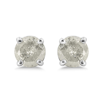 Front view of a pair of white metal stud earrings with round white gemstones in prong settings.