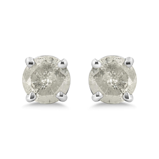 Front view of a pair of white metal stud earrings with round white gemstones in prong settings.