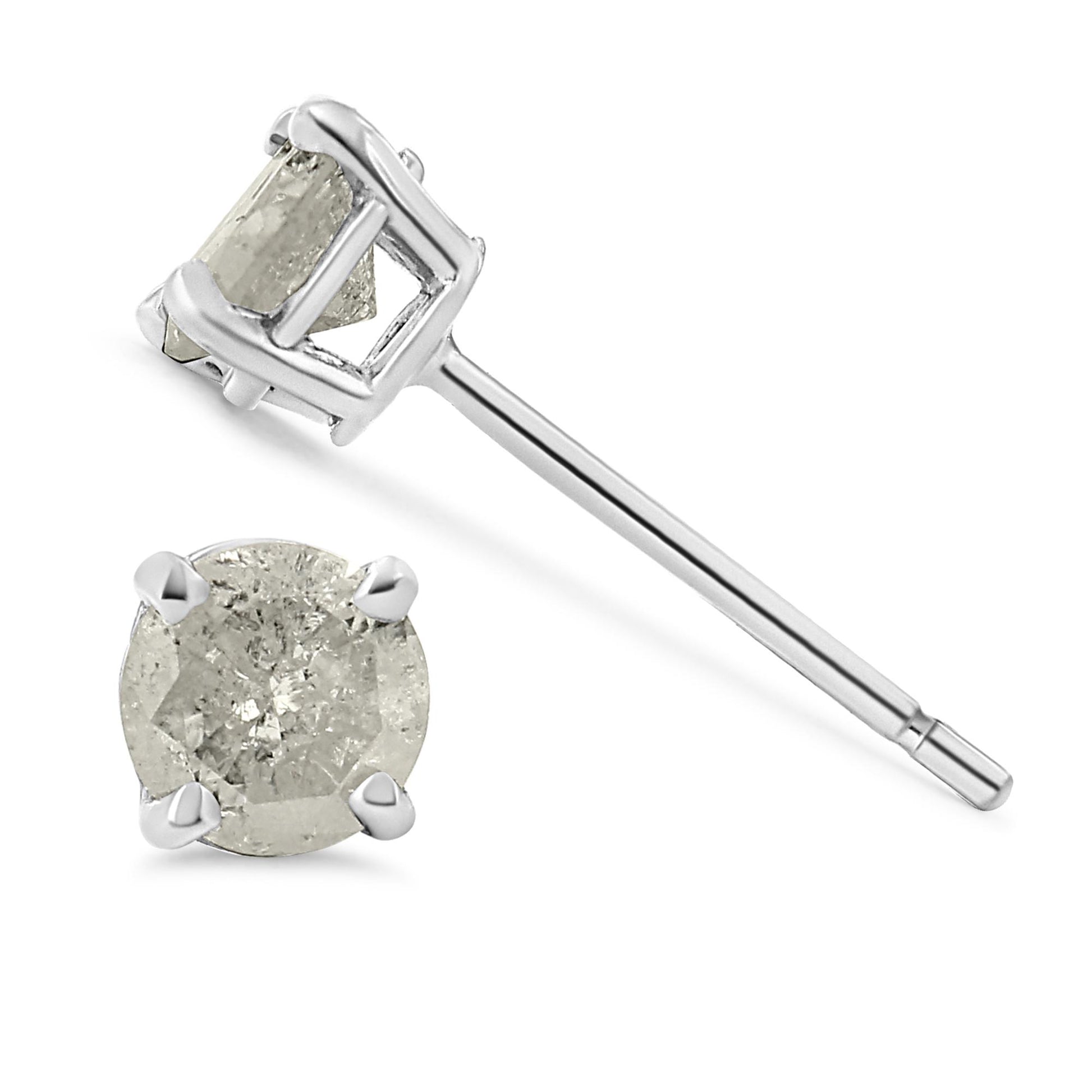 Close-up image of white metal stud earrings with round white gemstones in prong settings, shown from side and front angles.