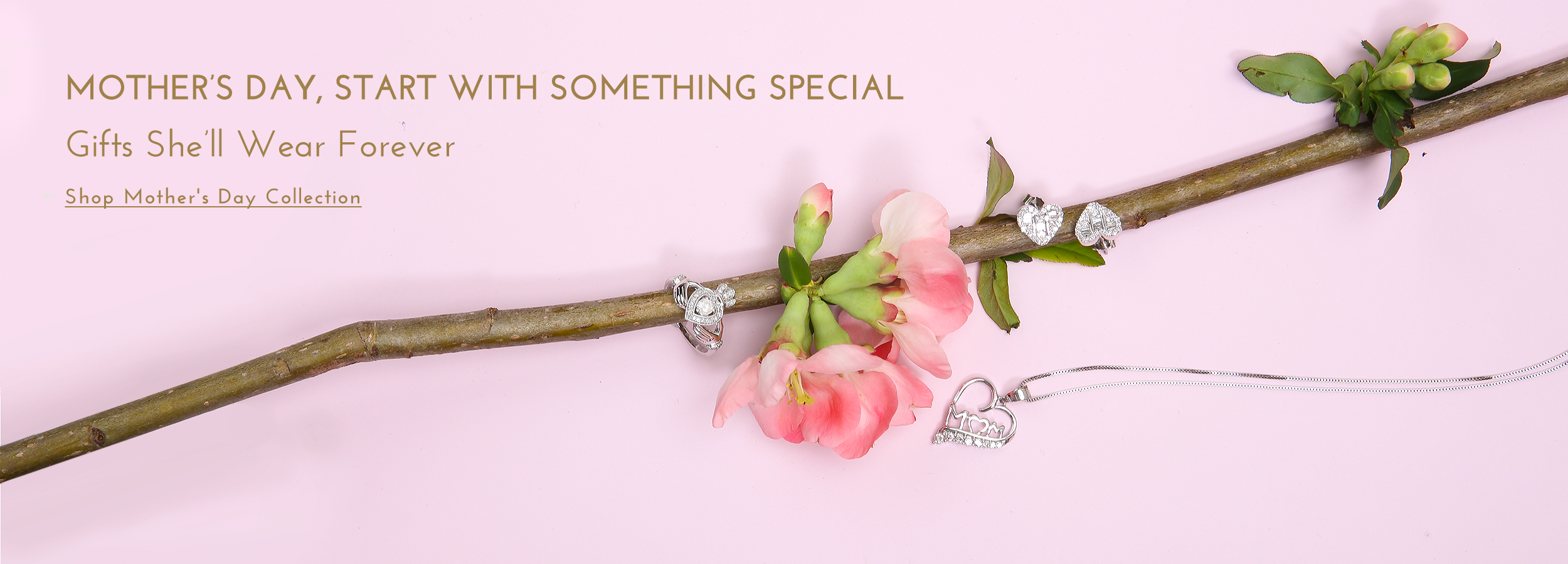 Floral necklace with pink flowers and green leaves on a branch against a light pink background, promoting Mother's Day jewelry gifts.