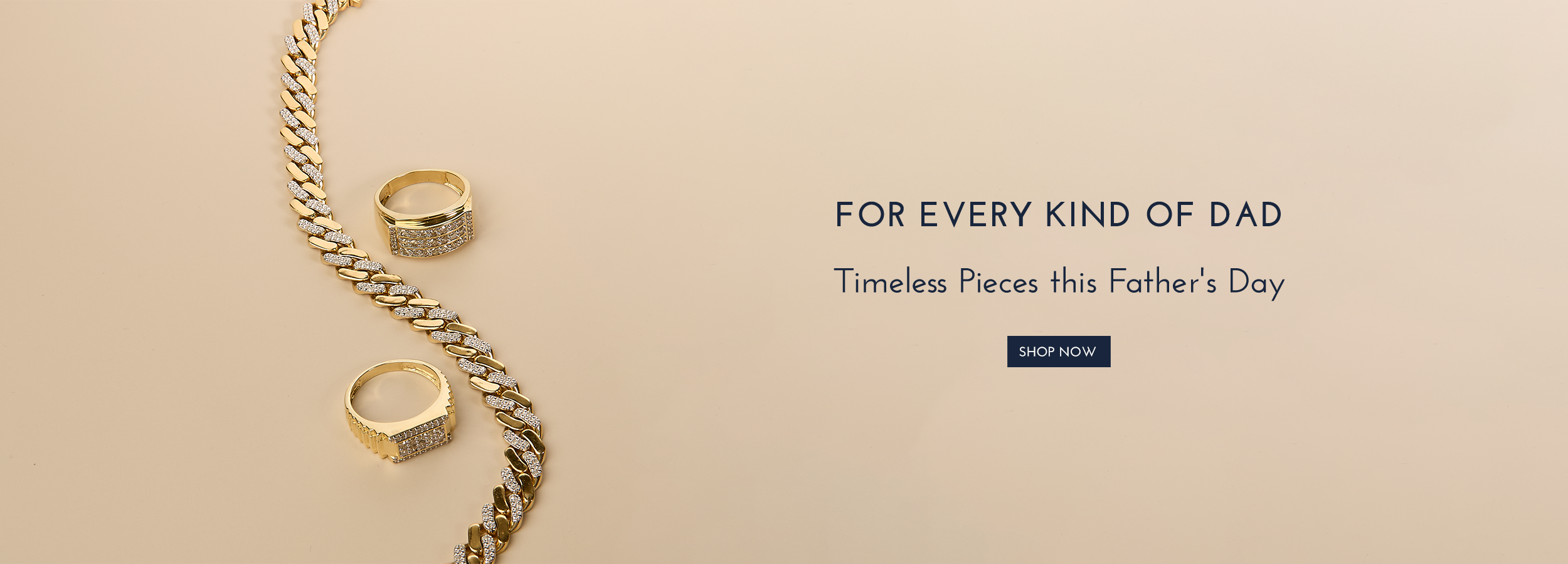 Gold jewelry including rings and a chain on a beige background with text for Father's Day.