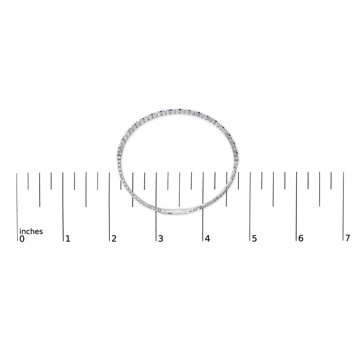White bracelet with alternating blue and white round gemstones in prong settings, shown flat on a ruler scale, top-down view.