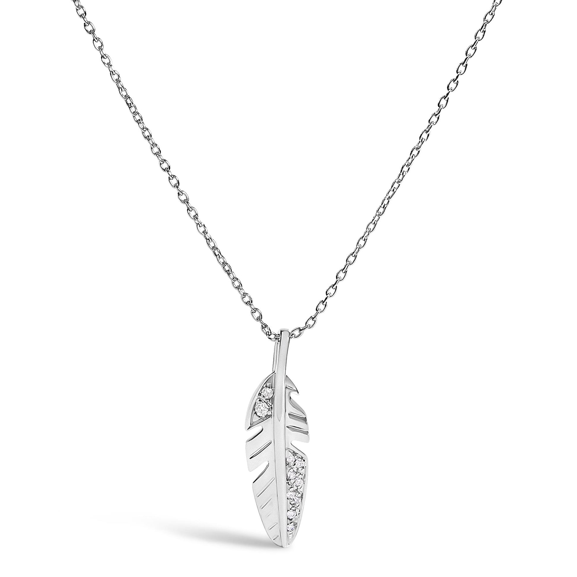 White metal feather-shaped pendant necklace with white round pave-set gemstones, shown from a front angle on a white background.