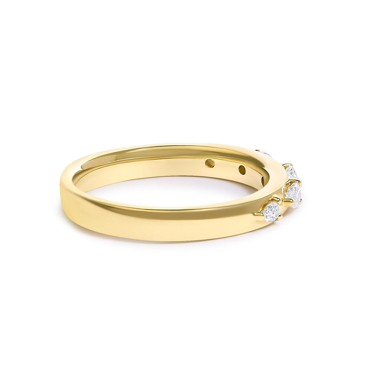 Yellow metal ring with five pear-shaped white gemstones set in a 3-prong setting, shown at an angled close-up.