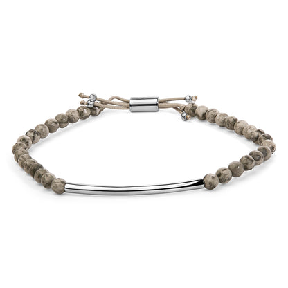 White beaded bracelet with a curved white metal bar centerpiece and adjustable cord, shown at a slight angle on a white background.