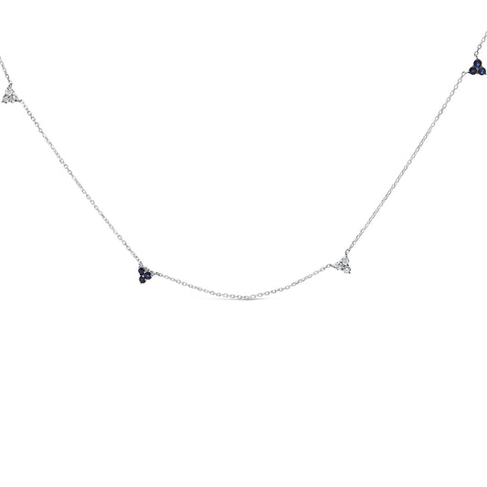 White metal necklace shown against a white background with round blue and white gemstones set in small clusters along the delicate chain, photographed from a front angle.