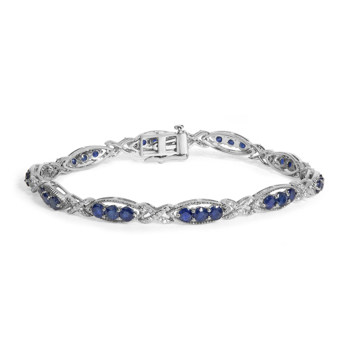 Close-up image of a white metal bracelet with alternating oval and twisted link design, featuring blue round gemstones and small white round gemstones in prong settings, shown flat from a slightly elevated front angle.